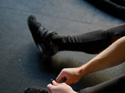 Detail of sports shoes on a professional gym floor
